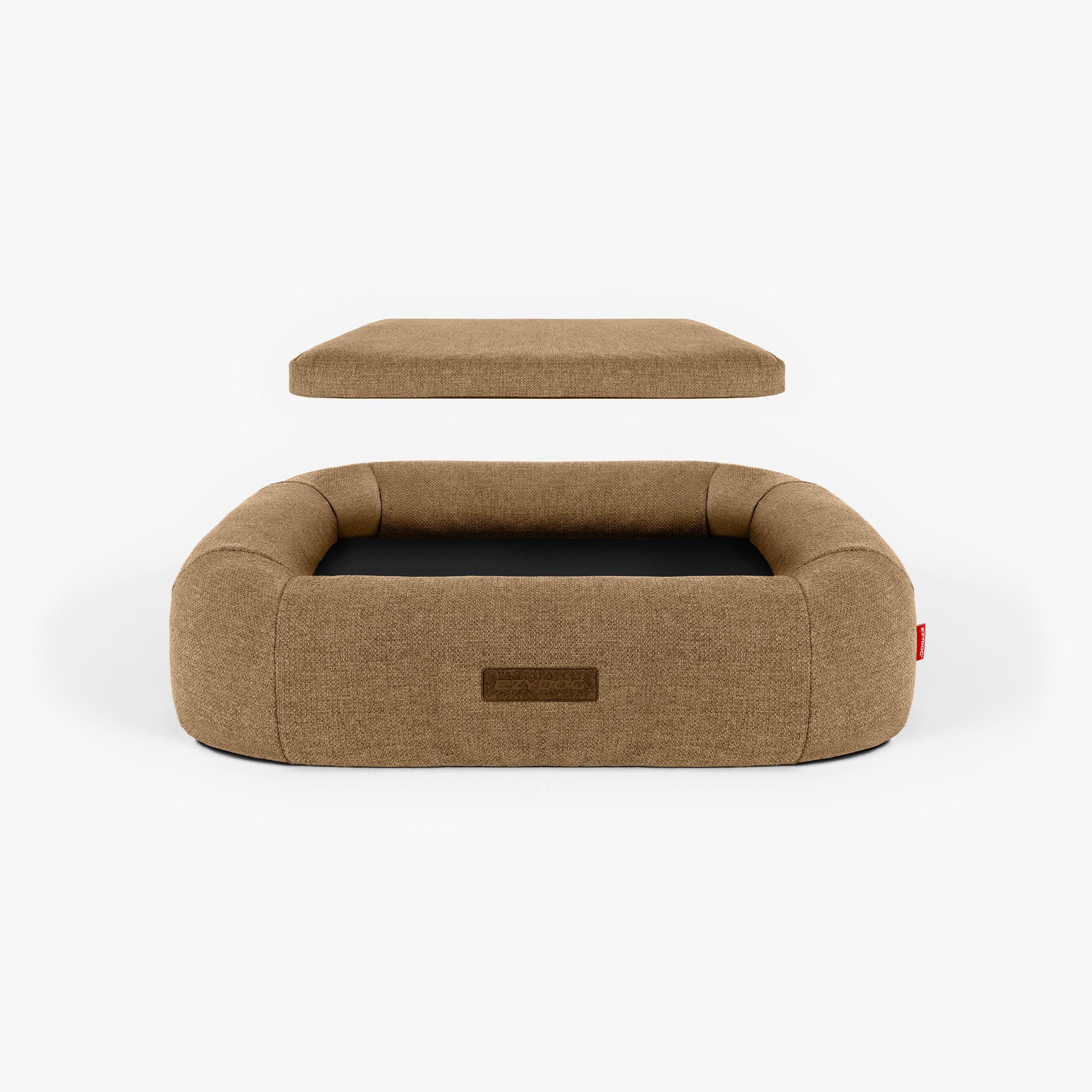 Brown dog bed with detachable cushion on a white background