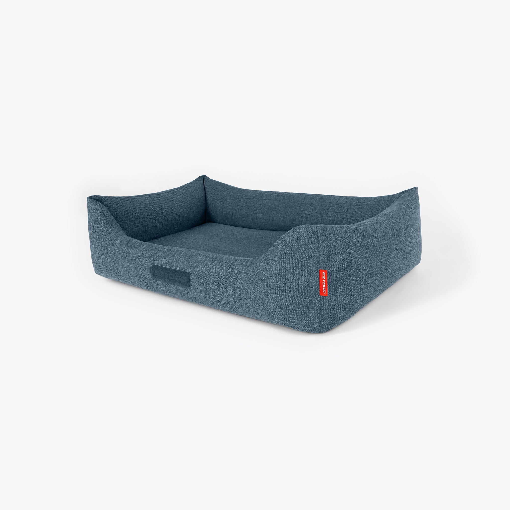 Blue pet bed with a red tag on a white background