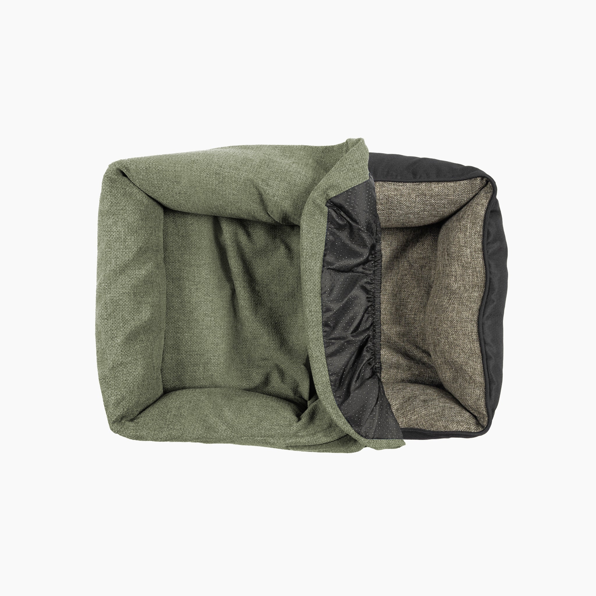 Green and black fabric folded on a white background
