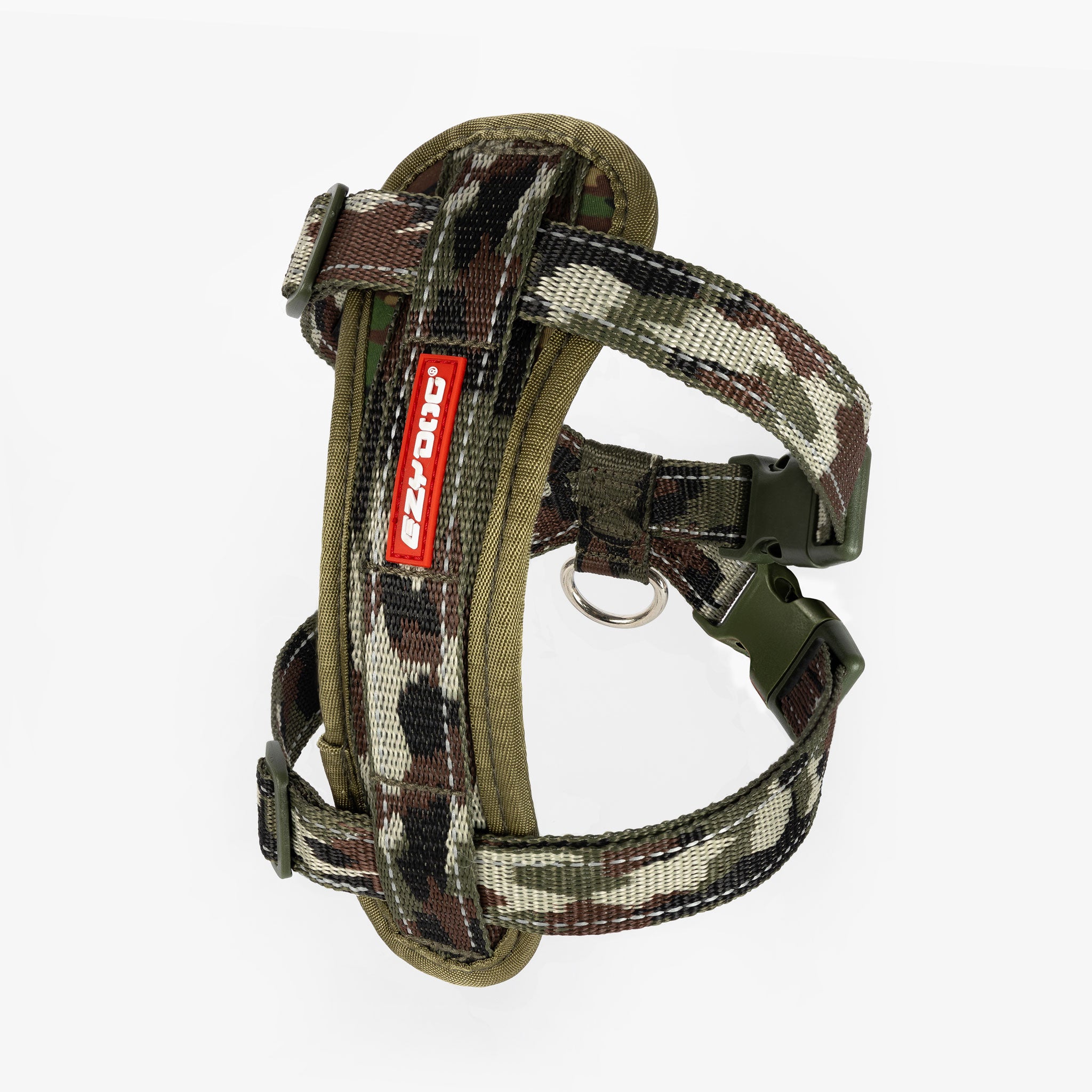 A camouflage chest plate harness for dogs with adjustable straps and a metal ring, designed by EzyDog.