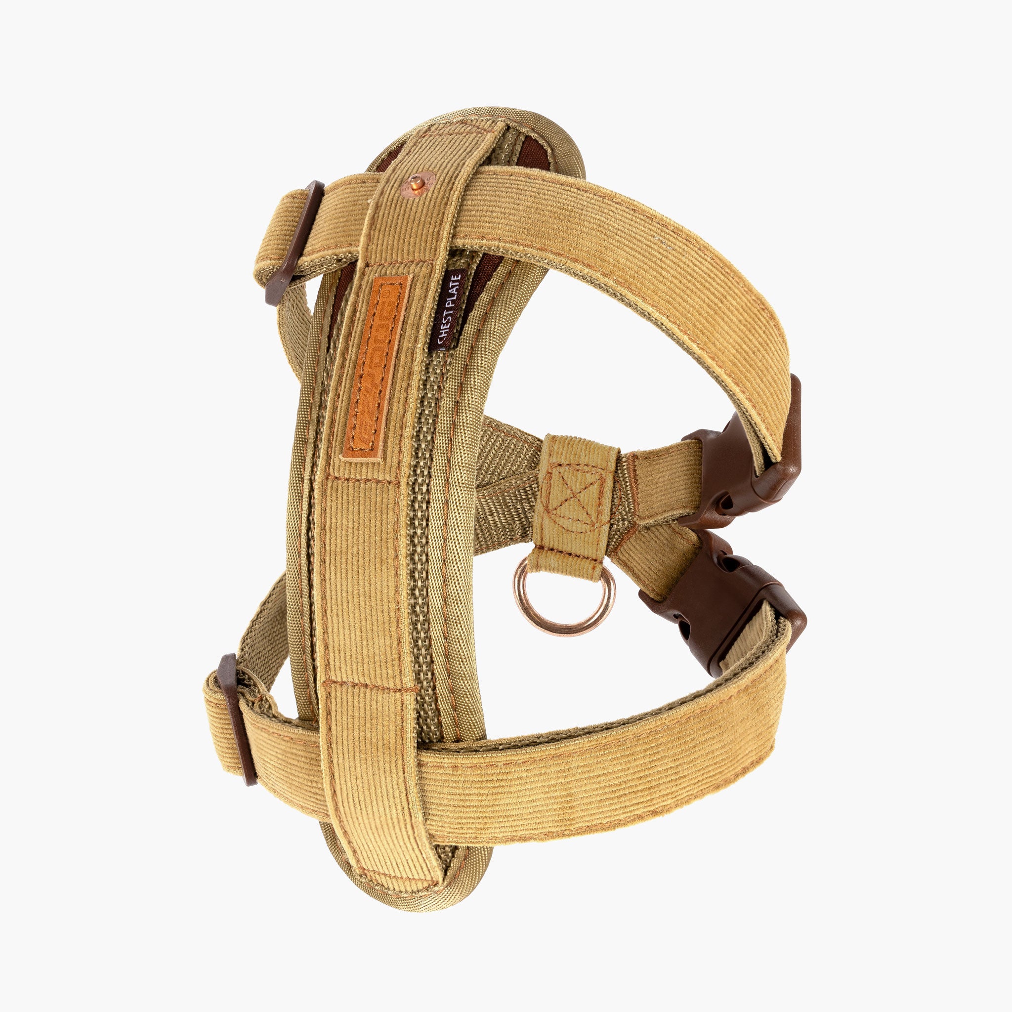 A brown corduroy dog chest plate harness with adjustable straps and metal rings, designed for training and everyday use.