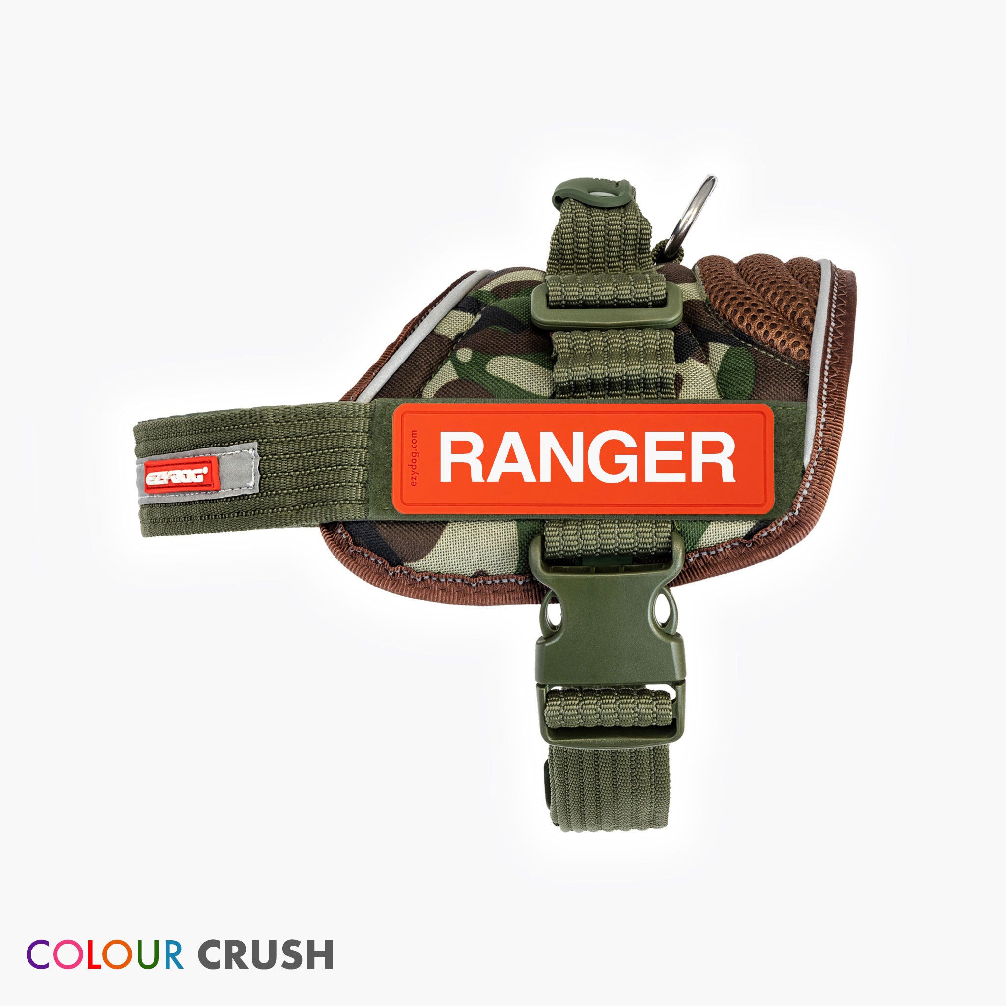 A camouflage dog harness with a red label that says 'RANGER' and other adjustable straps and metal D-ring.