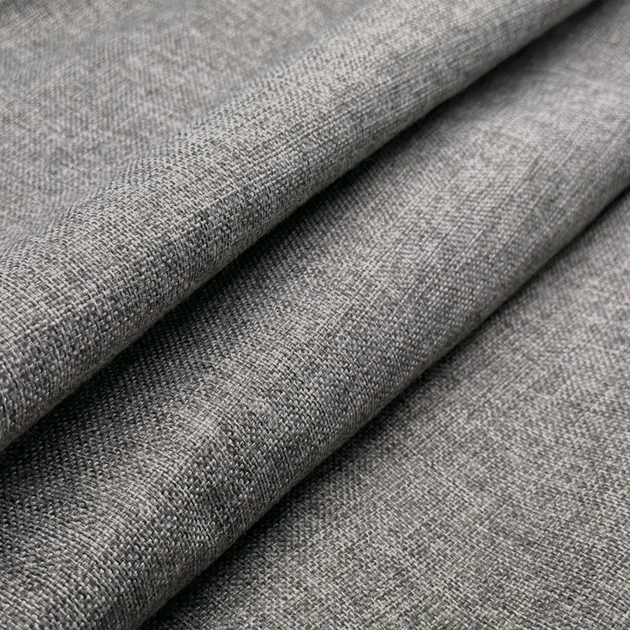 Close-up of gray fabric with a subtle pattern