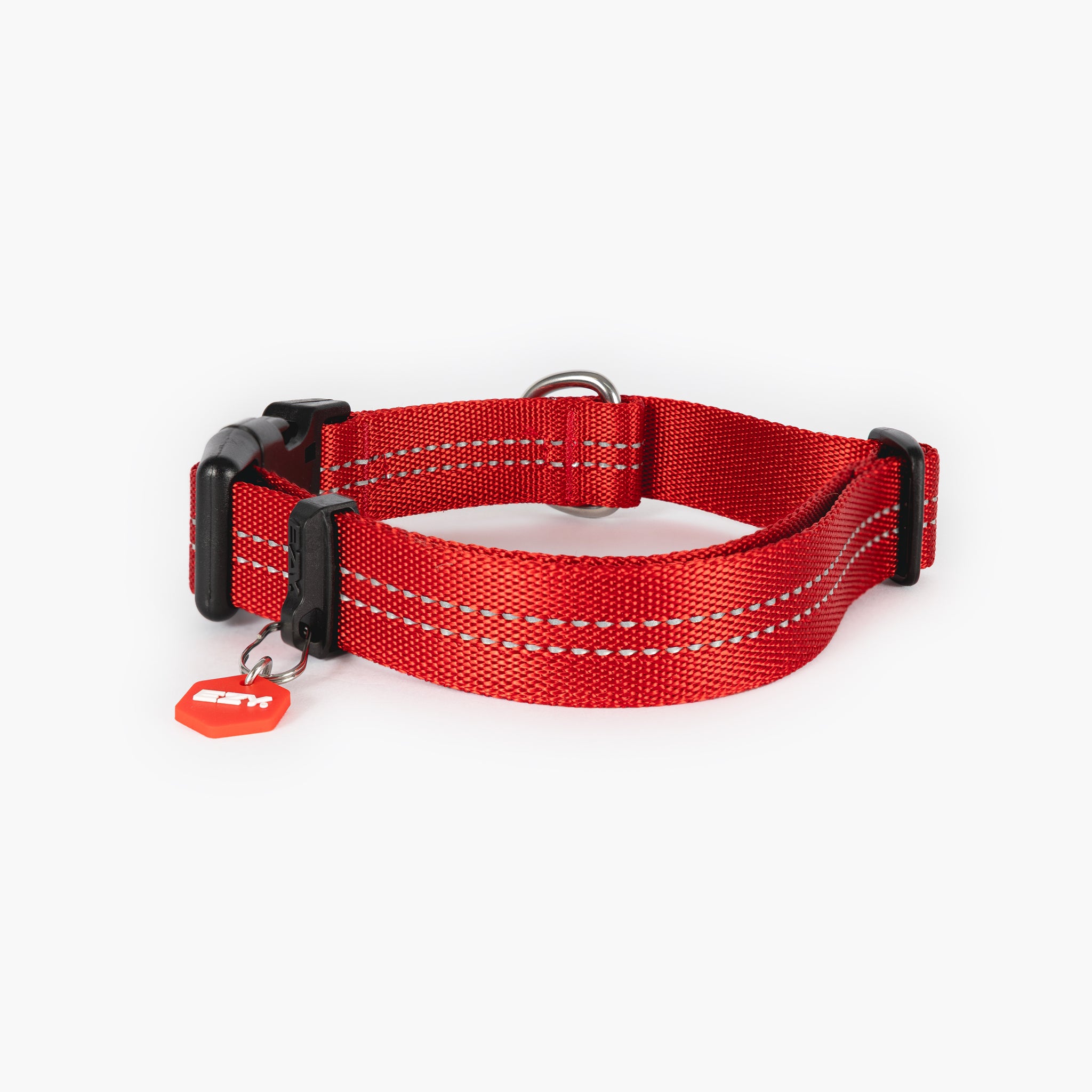 Red dog collar with a reflective strip on a white background