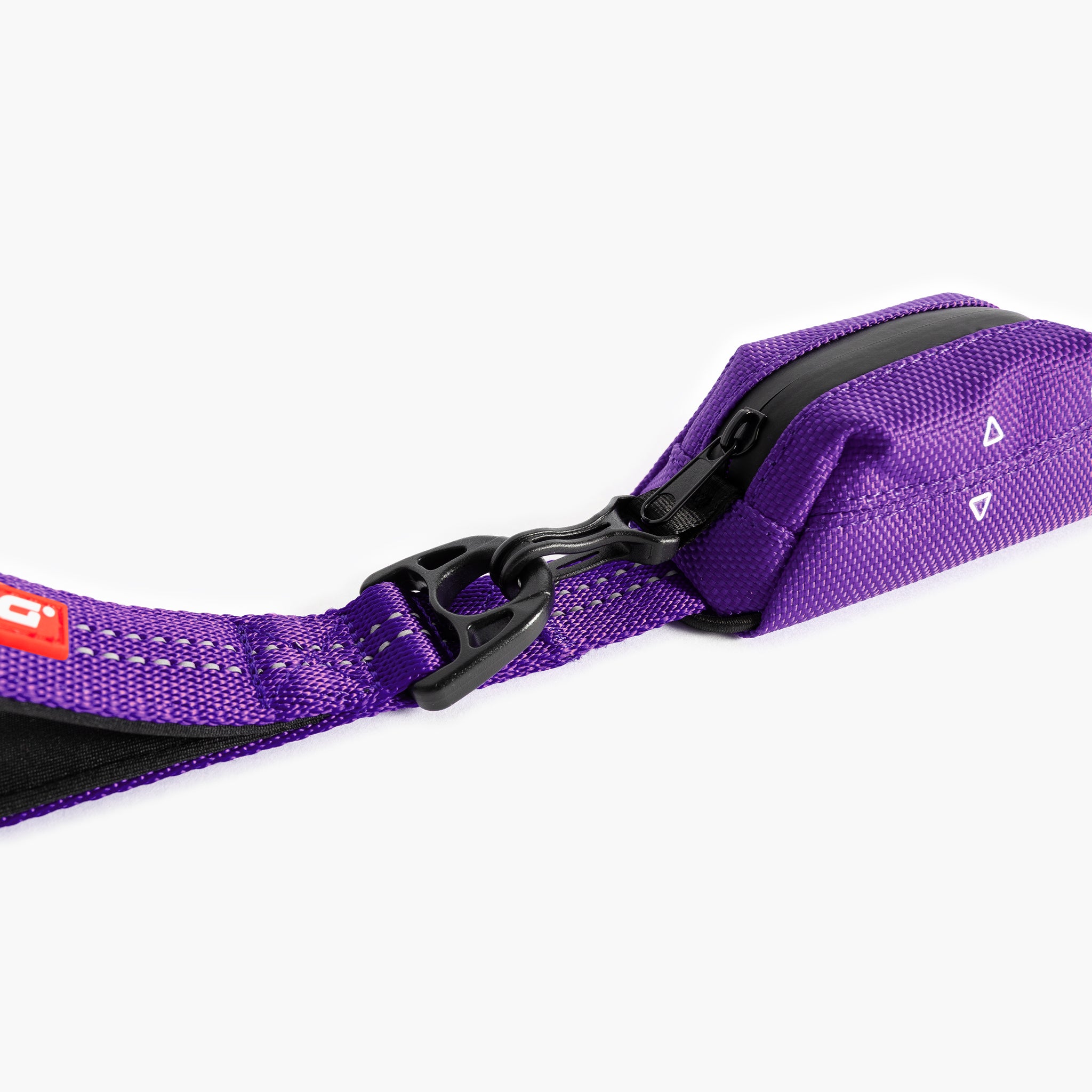 Purple Essential Dog Poop Bag Holder with a black clip on a white background