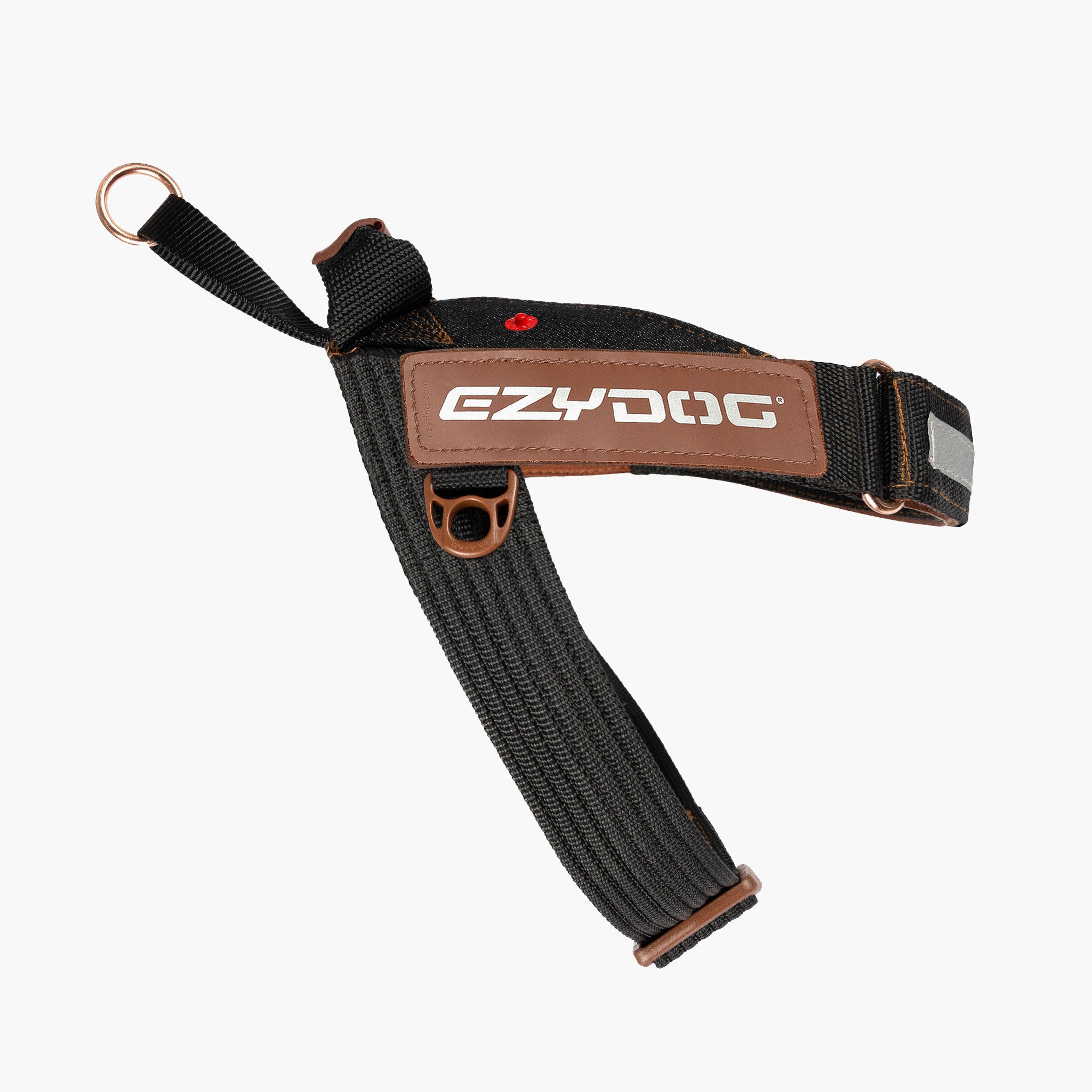 Black dog harness with brown leather patch and 'EzyDog' branding on a white background