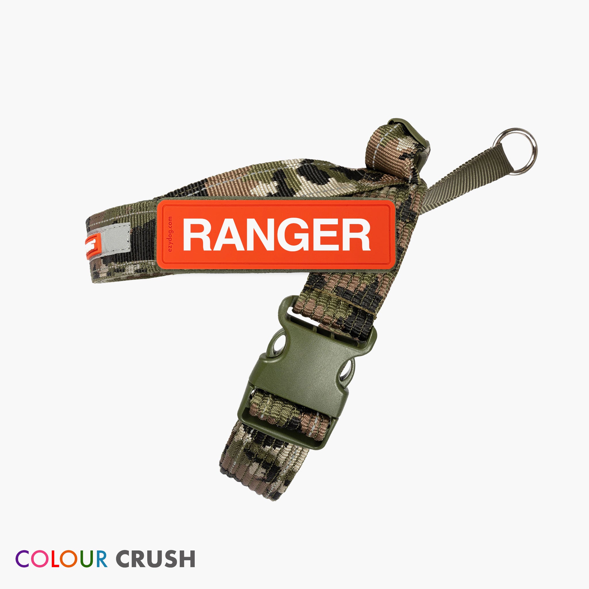 A camouflage dog harness with a green buckle and a label with the text 'RANGER' on it, displayed against a white background.