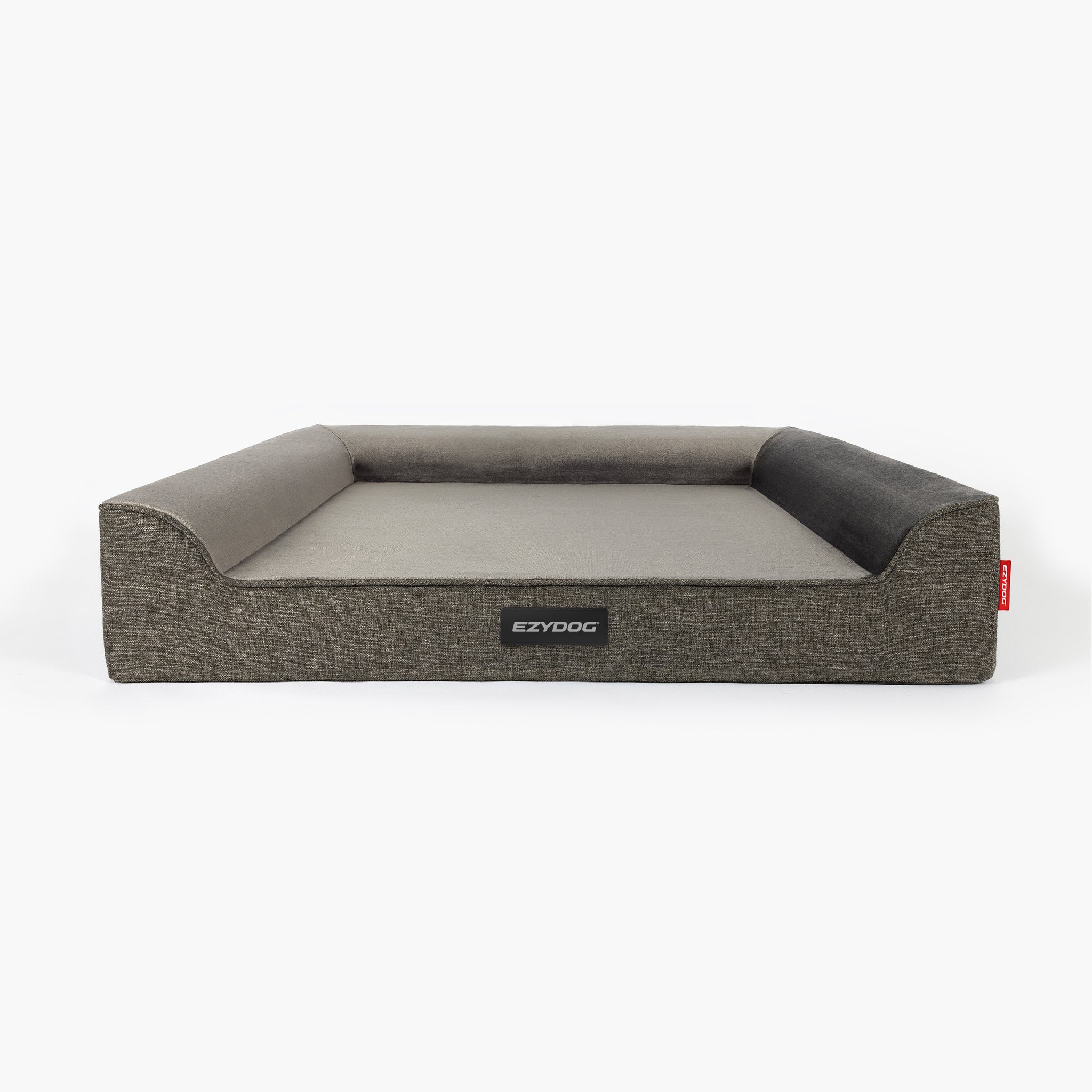 Gray Next Gen Orthopaedic Lounger Dog Bed with a red tag on a white background