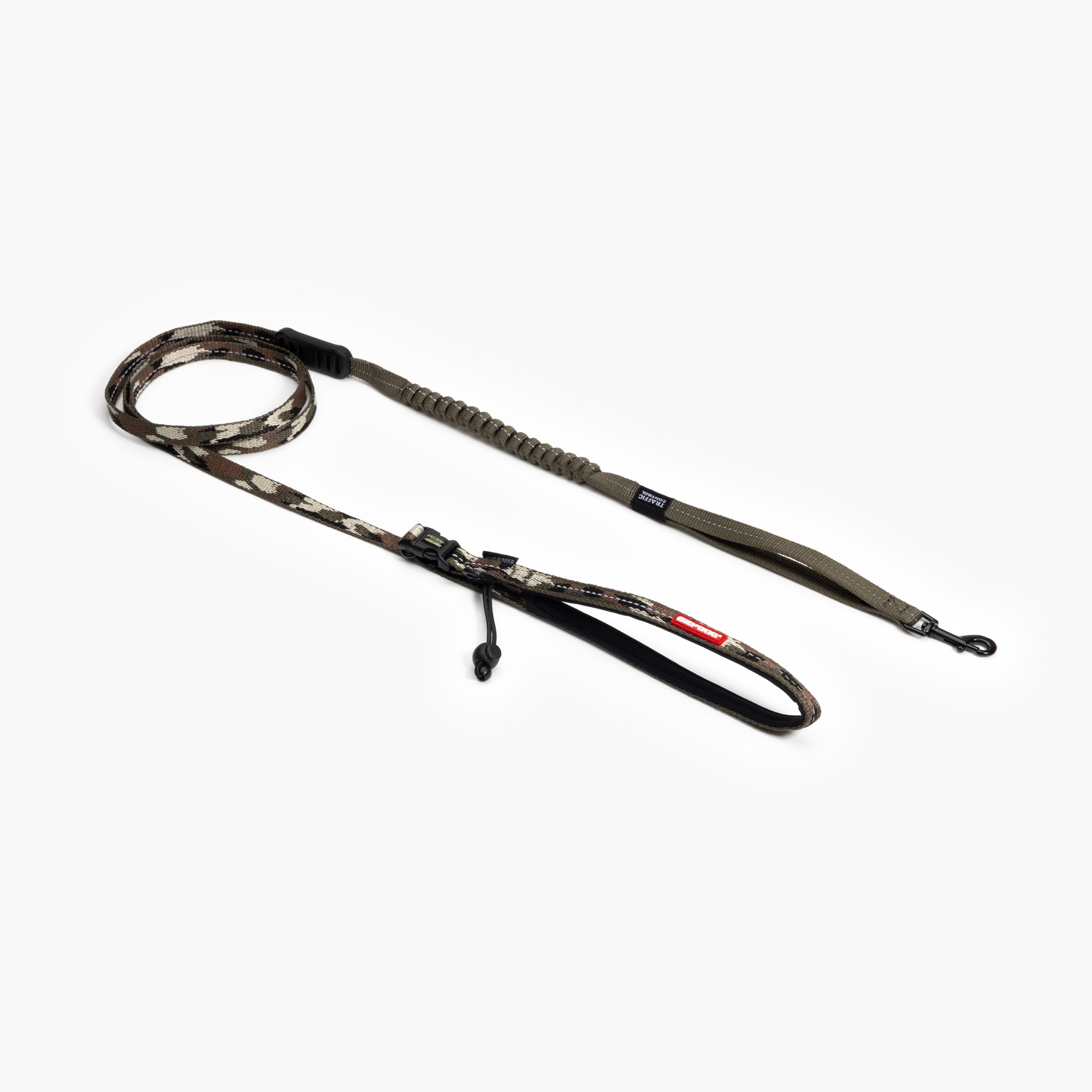 A camouflaged hands-free dog leash laid out on a white background, featuring a comfortable handle, adjustable length, and a zero shock absorbing system.