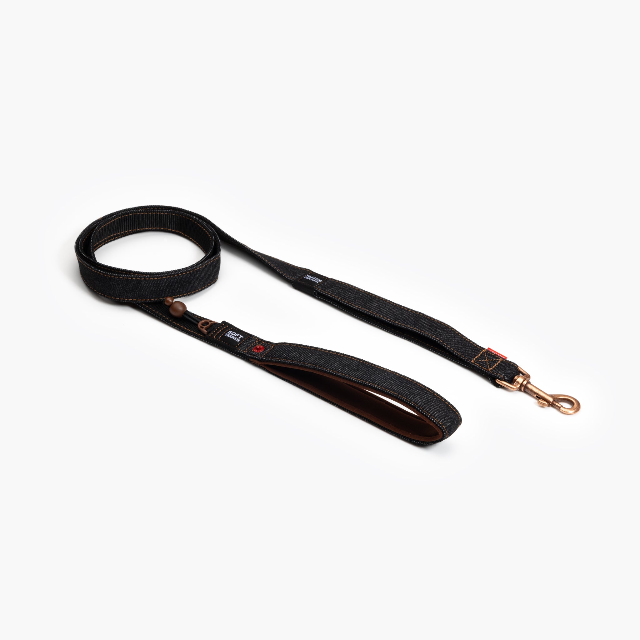 A black denim dog leash with a neoprene-lined handle and a barrel lock, on a white background.