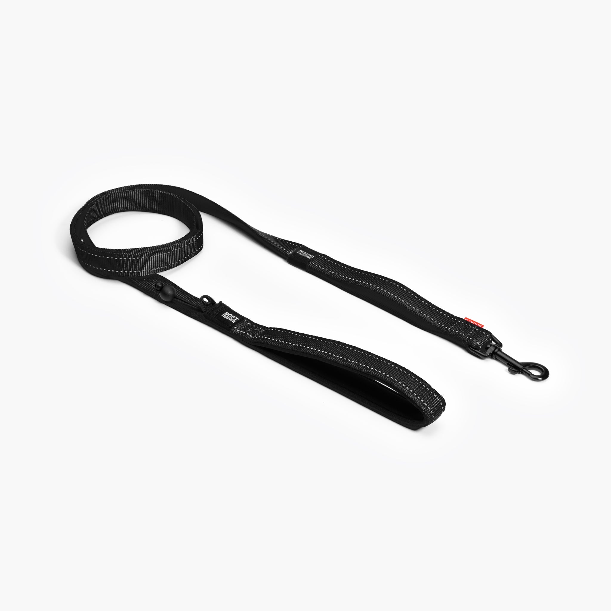A black EzyDog Soft Trainer Dog Leash with reflective trim, neoprene-lined handle, and barrel lock.