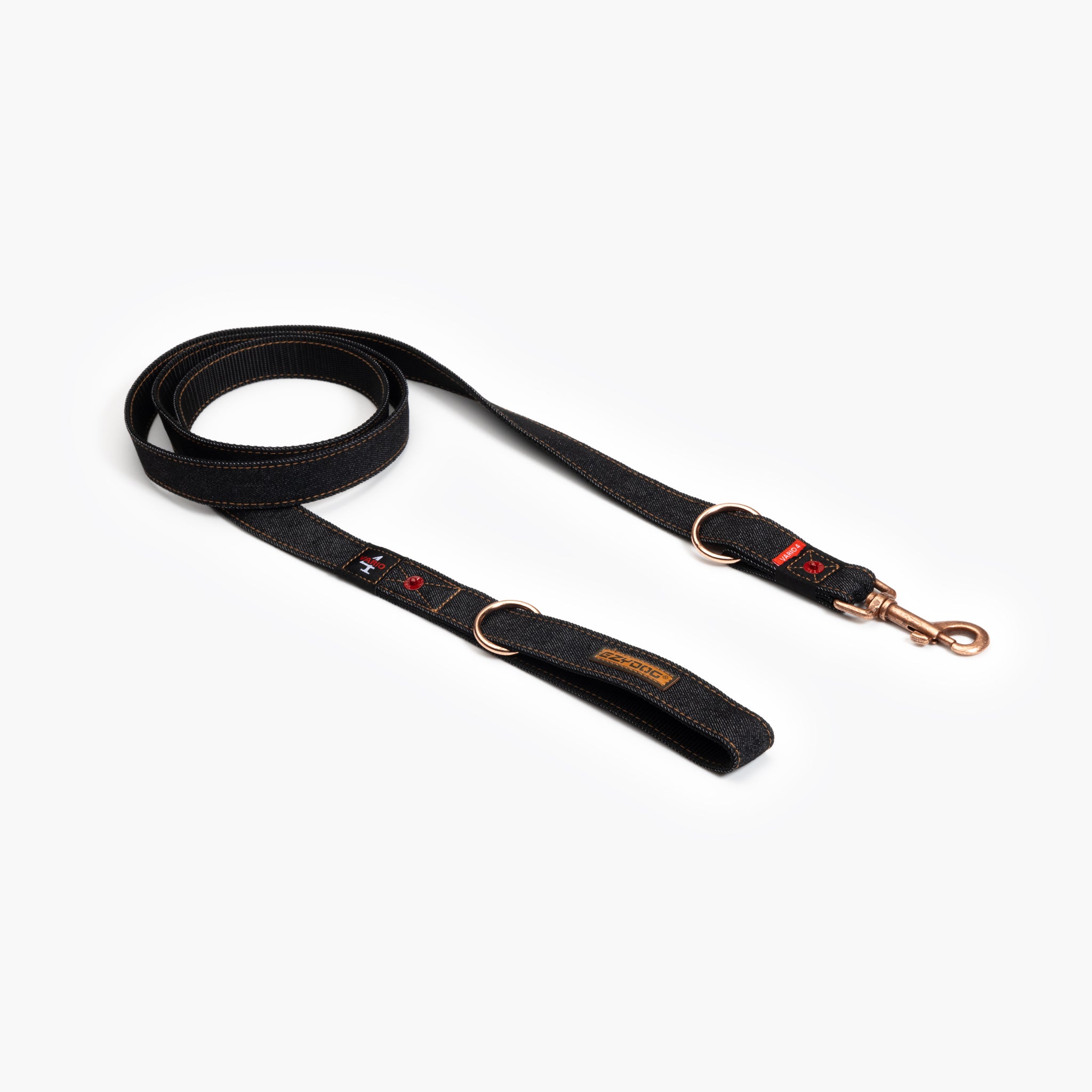 A black Vario 4 Multi-Function Leash with a quick-release buckle and adjustable length, displayed on a white background.