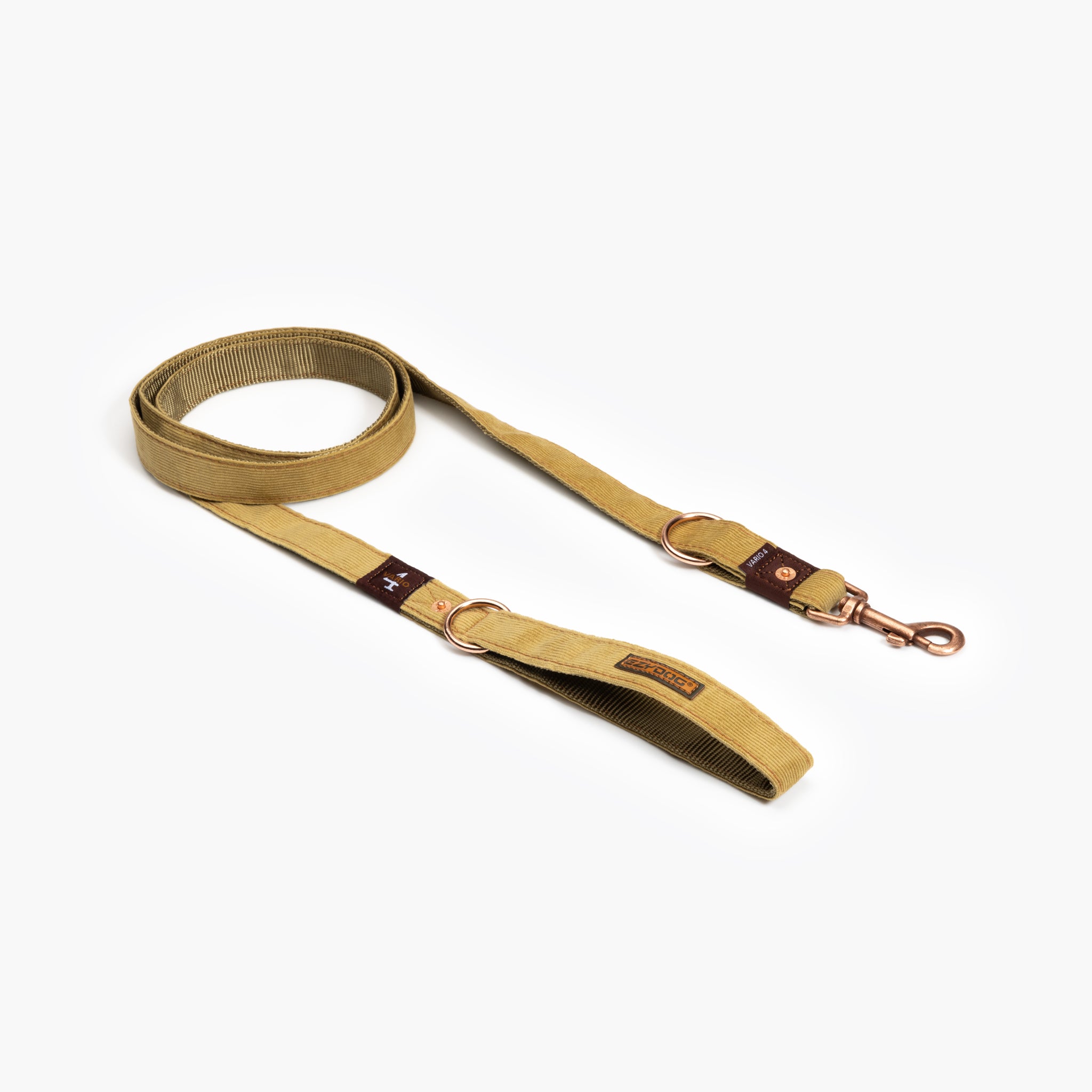 A beige Vario 4 Multi-Function Leash made of corduroy, featuring an adjustable length and a metal clasp, displayed on a white background.