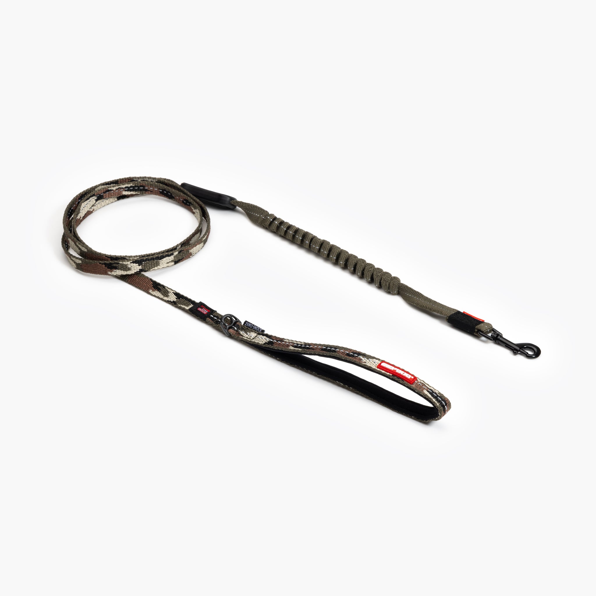 A camouflage patterned dog leash with a shock-absorbing feature in the middle, a neoprene lined handle, and reflective trim.