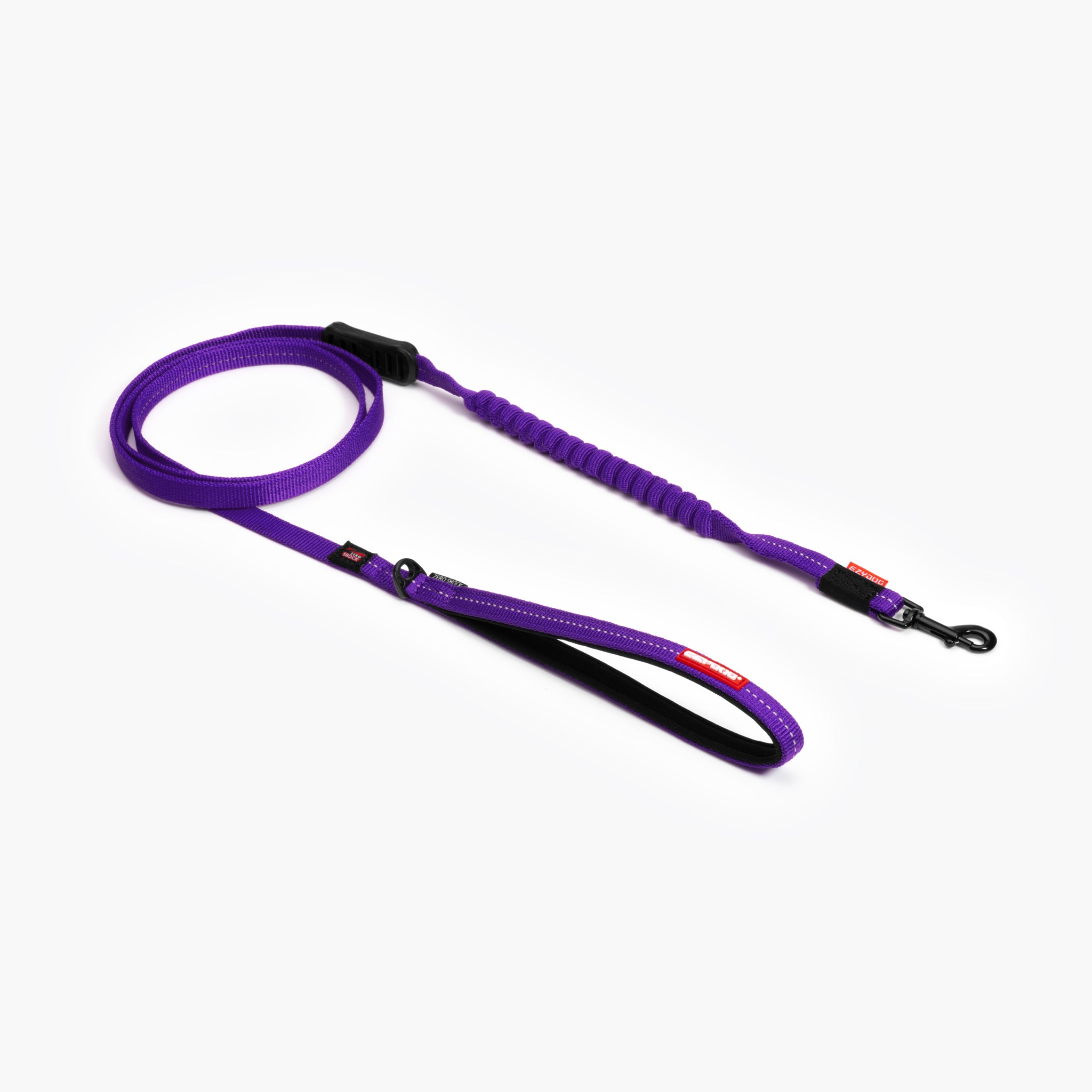 A purple Zero Shock Leash LITE designed for smaller dogs, showing a shock-absorbing center and a neoprene lined handle.