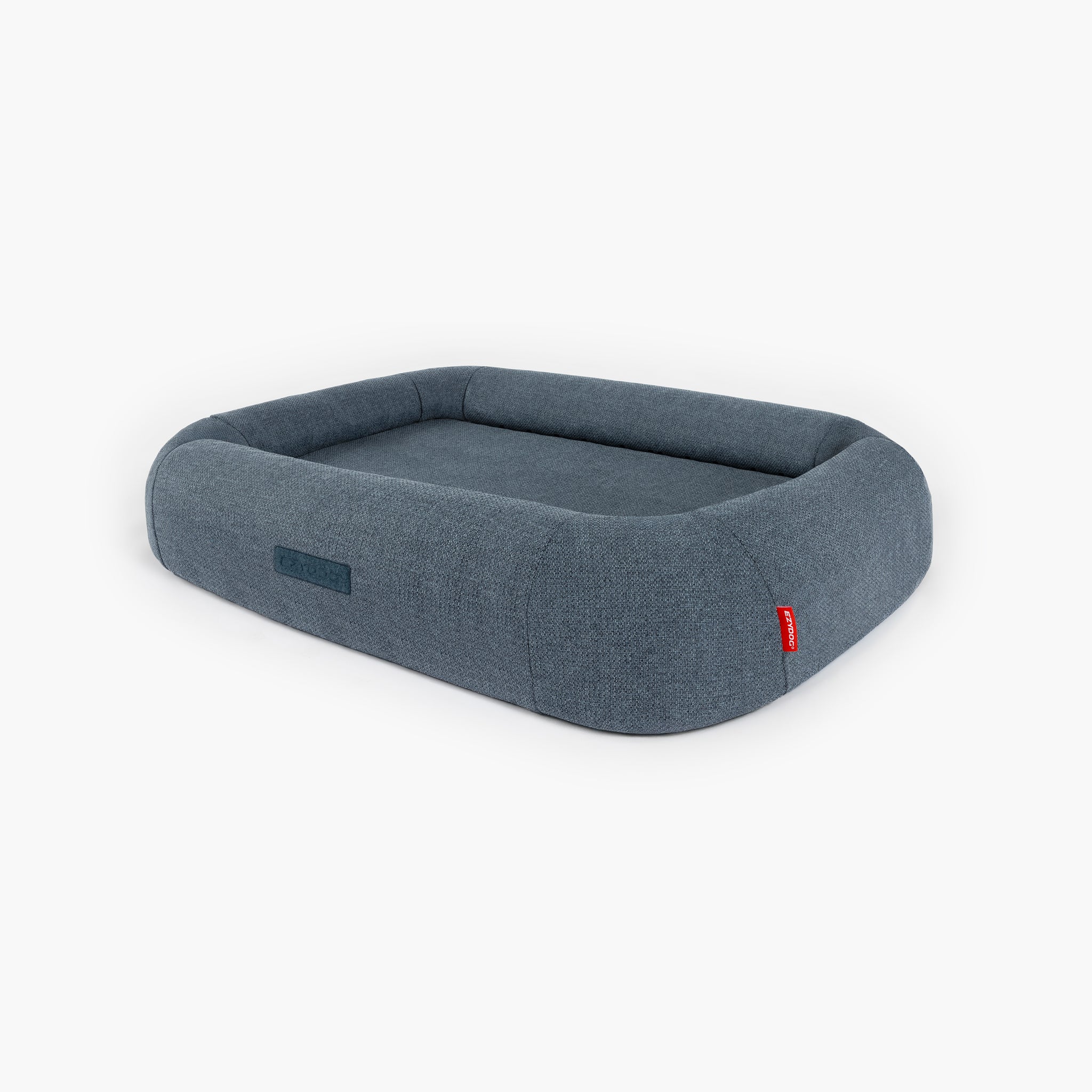 Gray dog bed with a red tag on a white background