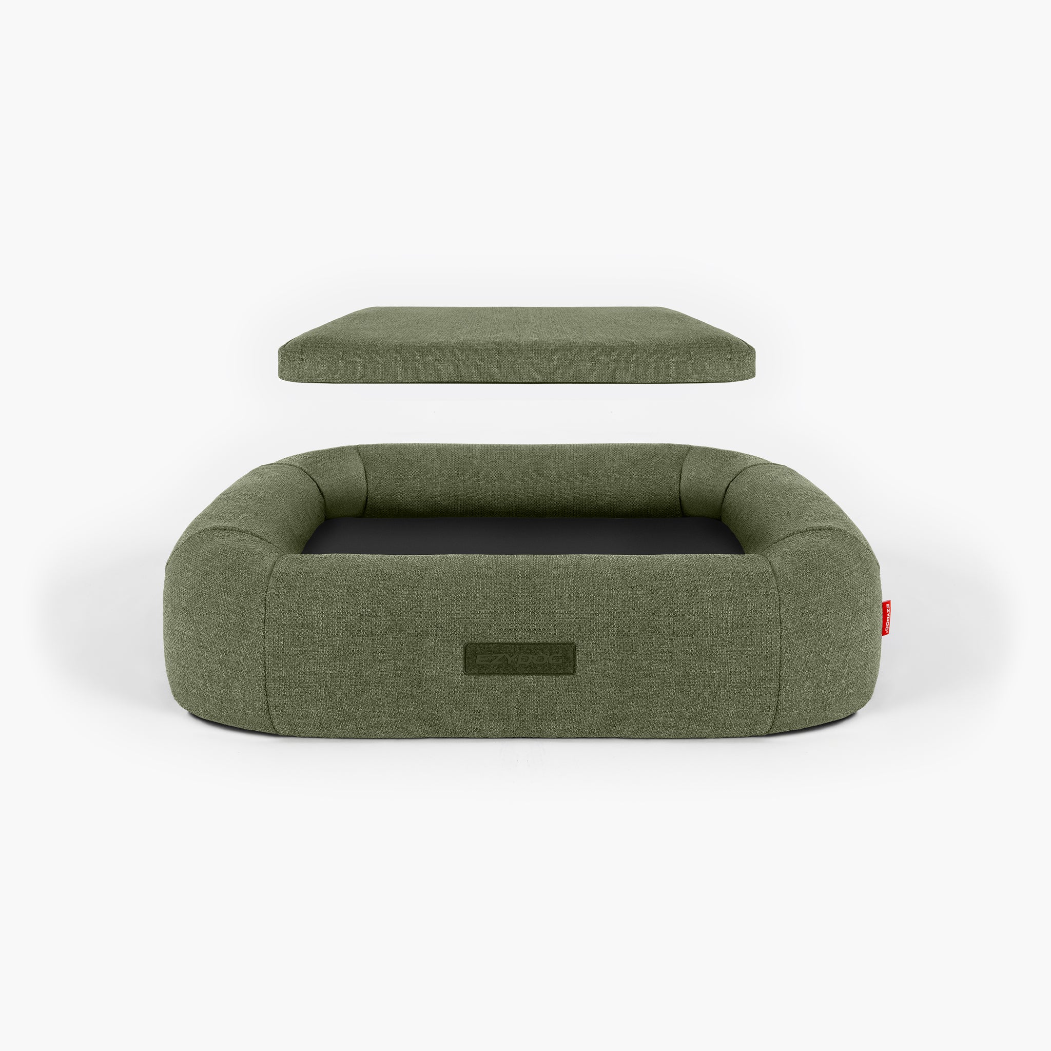 Green dog bed with a detachable cushion on a white background