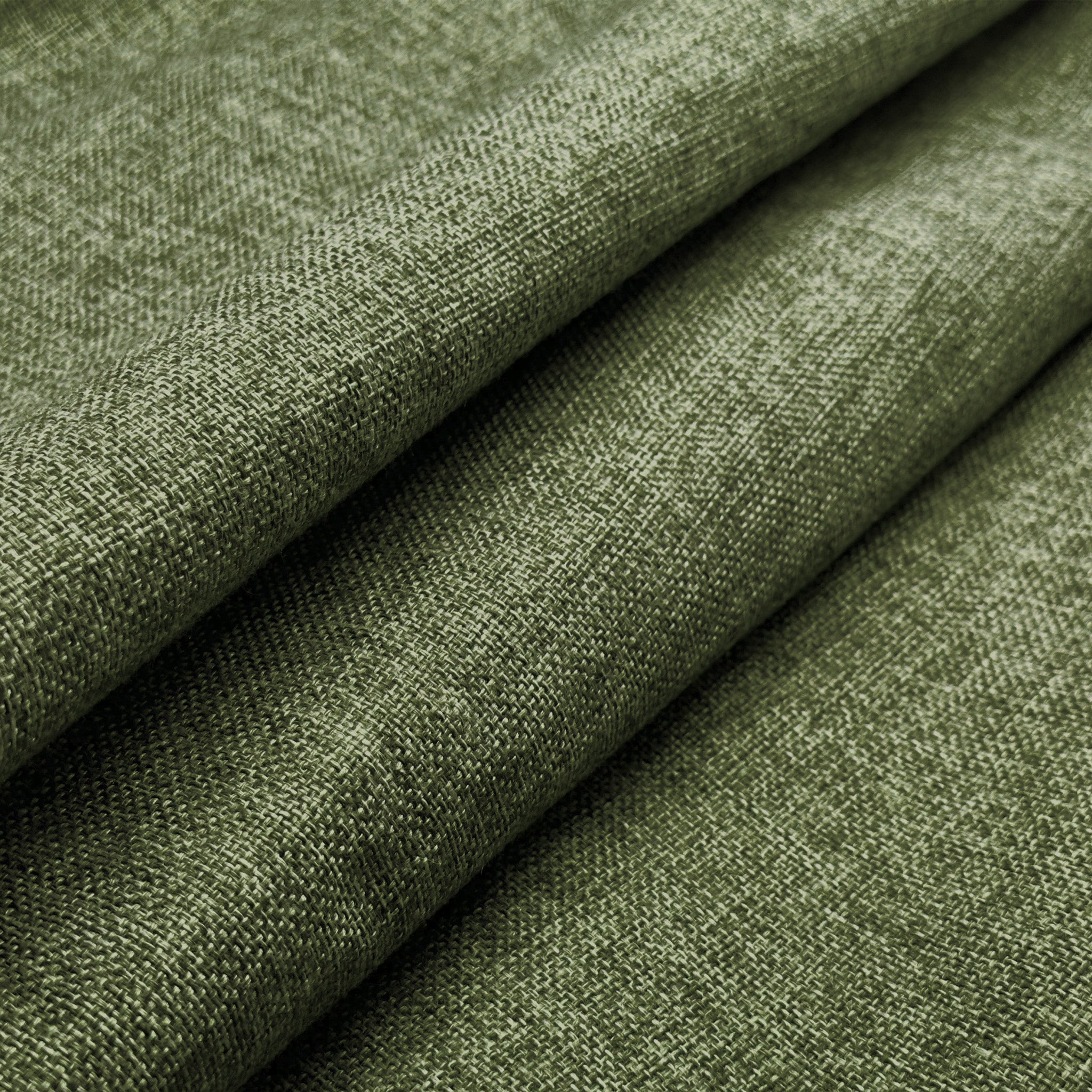 Close-up of green fabric with a textured pattern